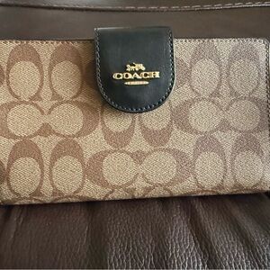Coach Brown Signature Canvas Phone Wallet with Black Trim and Gold Logo